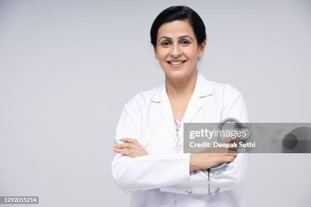 portrait female doctor - stock photo - indian ethnicity stock pictures, royalty-free photos & images