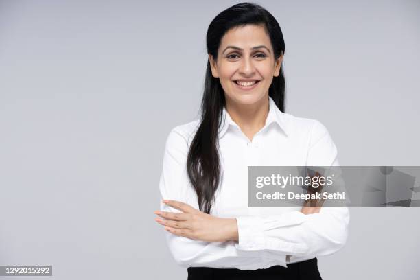 business woman - stock photo - standing arms crossed stock pictures, royalty-free photos & images