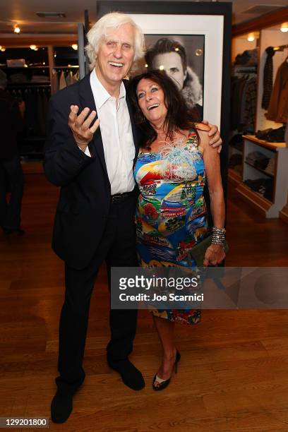 Douglas Kirkland and wife Francoise attend the Douglas Kirkland Photo Exhibition Celebrating 180 Years Of Woolrich at Ron Herman Melrose on October...