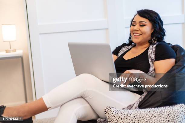 native american generation z female using technology working from home during pandemic photo series - z com stock pictures, royalty-free photos & images