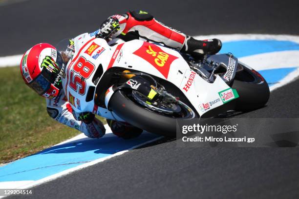 Marco Simoncelli of Italy and San Carlo Honda Gresini rounds the bend during practice for the Australian MotoGP, which is round 16 of the MotoGP...