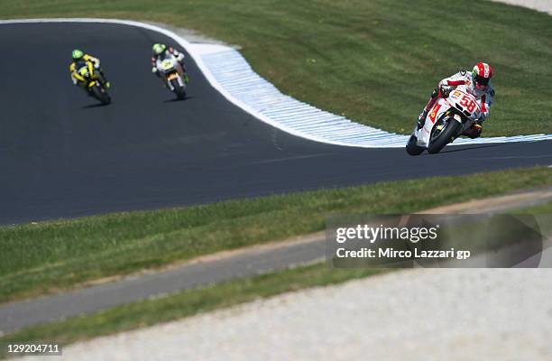 Marco Simoncelli of Italy and San Carlo Honda Gresini rounds the bend during practice for the Australian MotoGP, which is round 16 of the MotoGP...