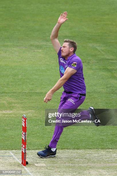 James Faulkner of the Hurricanes bowls during the Big Bash League match between the Hobart Hurricanes and Melbourne Renegades at Blundstone Arena, on...