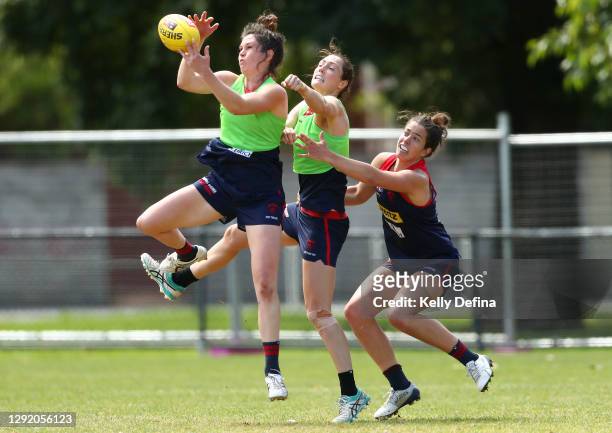 Gabby Colvin of the Demons marks the ball during a Melbourne Demons AFLW training session at Gosch's Paddock on December 19, 2020 in Melbourne,...
