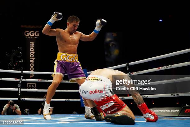 Kamil Szeremeta is knocked down by Gennadiy Golovkin in their IBF Middleweight title bout at Seminole Hard Rock Hotel & Casino on December 18, 2020...