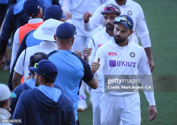 Virat Kohli of India shakes hands after the game during day three of the First Test match between Australia and India at Adelaide Oval on December...