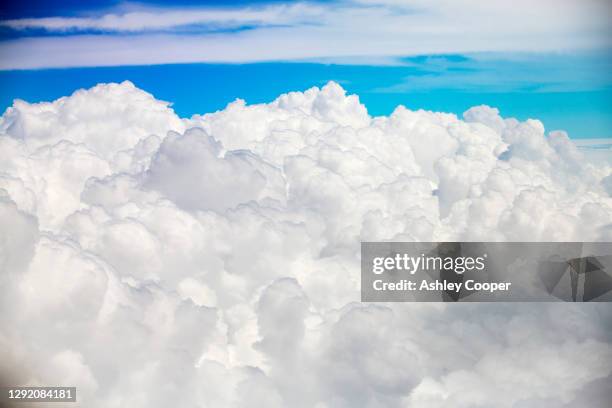 cumulo nimbus cloud seen from an airplane window over argentina. - cumulo stock pictures, royalty-free photos & images