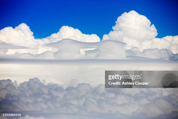 cumulo nimbus cloud seen from an airplane window over argentina. - cumulo stock-fotos und bilder