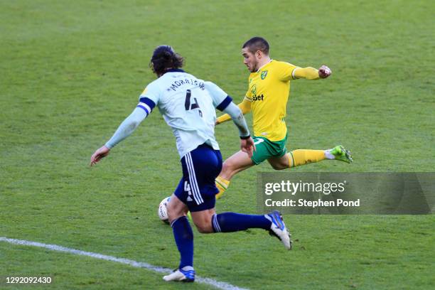 Emi Buendía of Norwich City scores their sides first goal during the Sky Bet Championship match between Norwich City and Cardiff City at Carrow Road...
