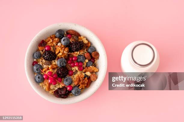 healthy breakfast with muesli and berries - granola stock pictures, royalty-free photos & images