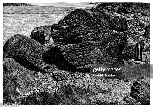 rock surface, gnawed by sandstorms - sandstone stock illustrations