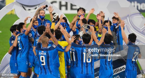 Ulsan Hyundai players lift the AFC Champions League after the AFC Champions League final between Persepolis and Ulsan Hyundai at the Al Janoub...