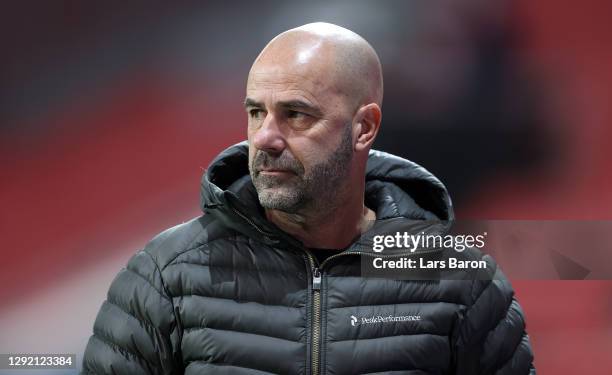 Peter Bosz, Head Coach of Bayer Leverkusen looks on prior to the Bundesliga match between Bayer 04 Leverkusen and FC Bayern Muenchen at BayArena on...