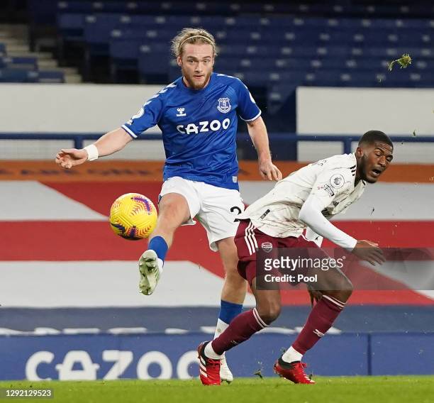 Ainsley Maitland-Niles of Arsenal is fouled by Tom Davies of Everton, leading to Arsenal being awarded a penalty during the Premier League match...