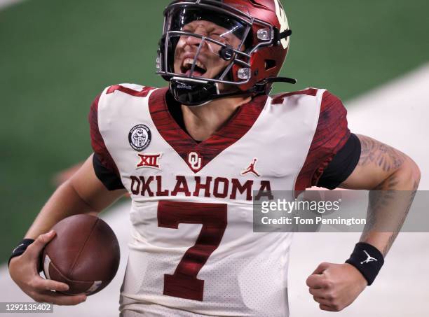 Spencer Rattler of the Oklahoma Sooners celebrates after scoring a touchdown against the Iowa State Cyclones in the second quarter of the 2020 Dr...