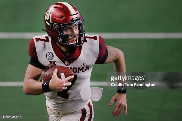 Spencer Rattler of the Oklahoma Sooners carries the ball to score a touchdown against the Iowa State Cyclones in the second quarter of the 2020 Dr...