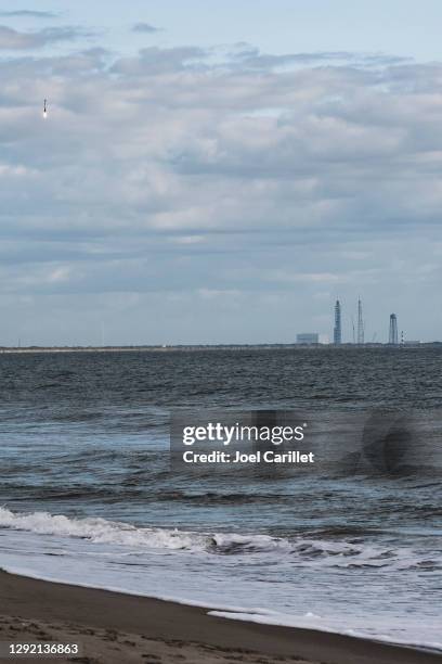 spacex rocket booster landing at cape canaveral after successful launch - rocket landing stock pictures, royalty-free photos & images
