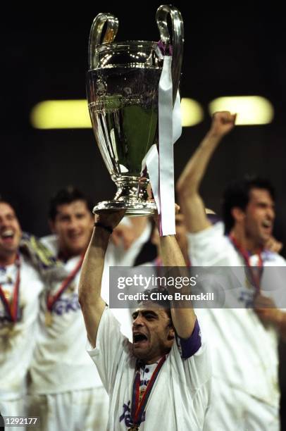 Real Madrid Captain Manuel Sanchis holds the trophy aloft after the Champions League final against Juventus at the Amsterdam Arena in Holland. Real...