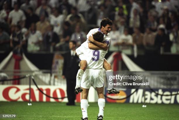 Raul and Davor Suker of Real Madrid celebrate after the Champions League final against Juventus at the Amsterdam Arena in Holland. Real Madrid won...