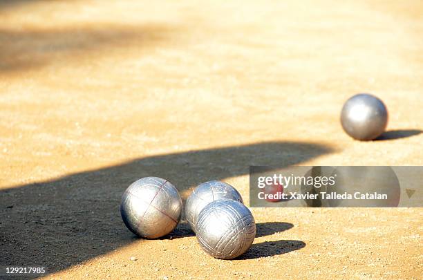 red ball - petanque stock pictures, royalty-free photos & images