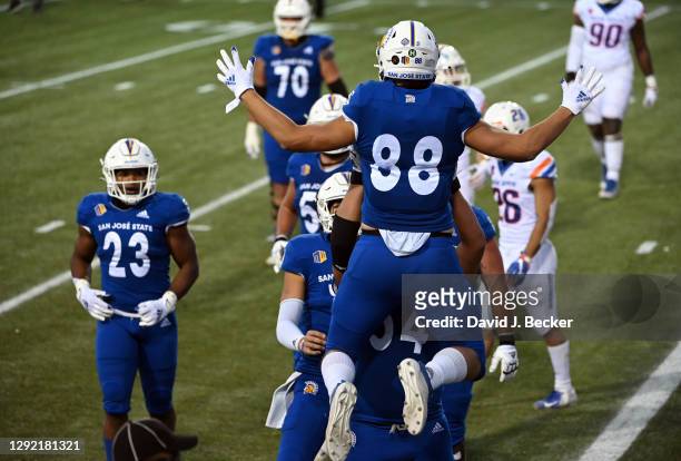 Tight end Sam Olson of the San Jose State Spartans reacts after scoring a two-point conversion in the second half of the Mountain West Football...