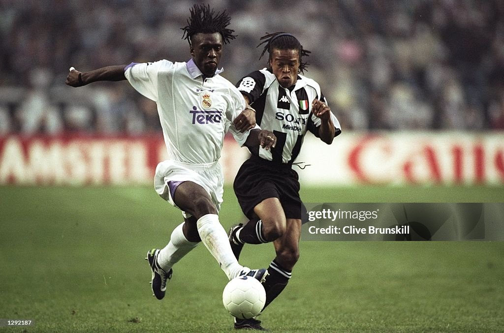 Clarence Seedorf of Real Madrid and Edgar Davids of Juventus