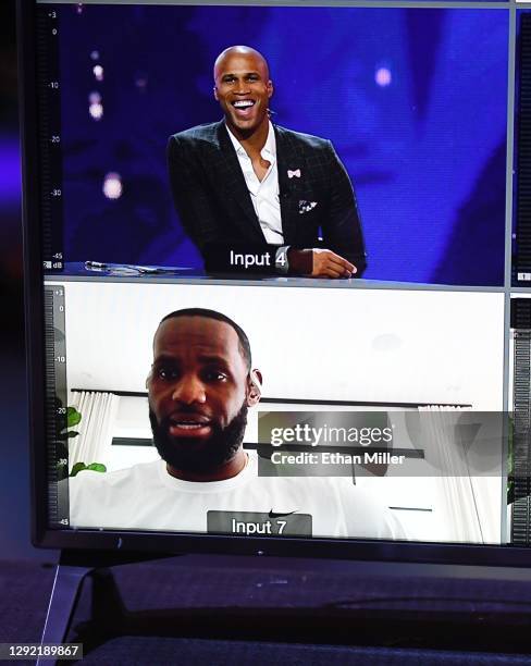 In this image released on December 19 NBA player LeBron James is shown talking to host Richard Jefferson on a screen via the Zoom videoconferencing...