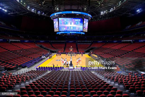 The teams warm up in an empty Stadium 1during the NBL pre-season game between the Sydney Kings and the Hawks at Qudos Bank Arena on December 20, 2020...