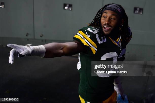 Running back Aaron Jones of the Green Bay Packers walks off the field after winning 24-16 over the Carolina Panthers at Lambeau Field on December 19,...