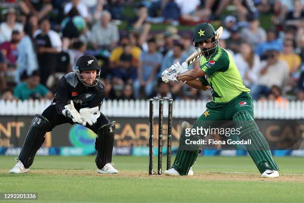 Mohammad Hafeez of Pakistan takes a shot with Tim Seifert of New Zealand during game two of the International T20 series between New Zealand and...