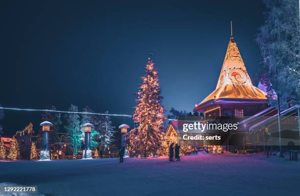 santa claus village and the arctic circle in rovaniemi, lapland finland - rovaniemi stock pictures, royalty-free photos & images