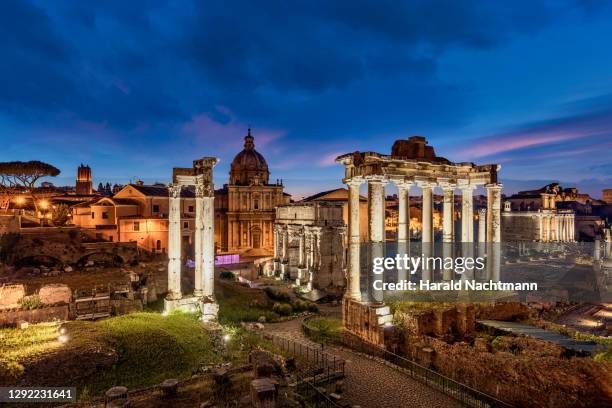 temple of vespasian and titus at forum romanum, rome, lazio, italy - arch of titus stock-fotos und bilder