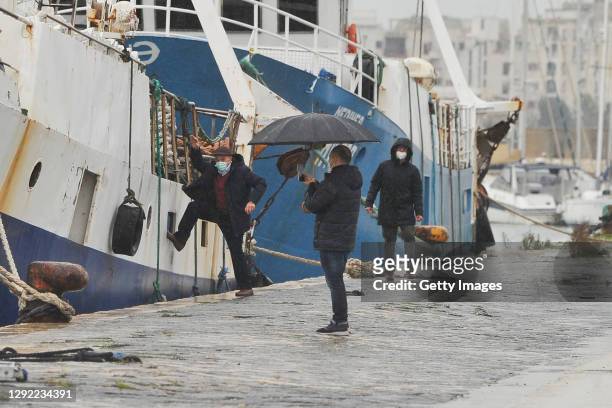 Italian fishermen return home after being held in Libya on December 20, 2020 in Mazara del Vallo, Italy. The 18 crew members of the fishing boats...