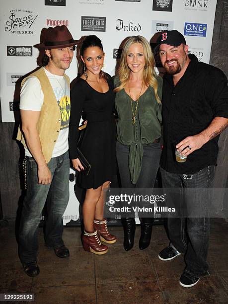 Clifton Collins Jr., a guest, Julie Benz and Troy Duffy attend "The Boondock Saints" Bike Benefit at Tuff Sissy & Co on October 13, 2011 in Los...