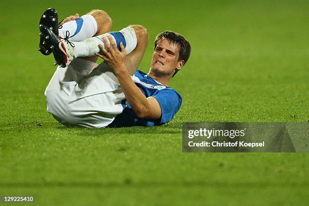 Jonas Acquistapace of Bochum lies on the pitch during the Second Bundesliga match between VfL Bochum and Eintracht Frankfurt at Rewirpower stadium on...