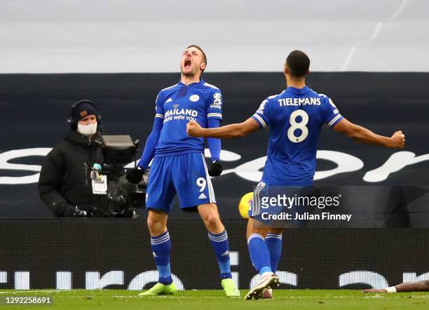 Jamie Vardy of Leicester City celebrates with team mate Youri Tielemans after their sides second goal, an own goal scored by Toby Alderweireld of...