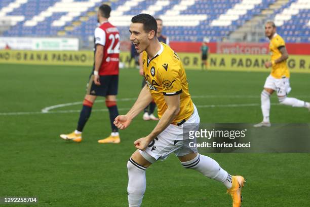 Kevin Lasagna of Udinese celebrates his goal 1-1 during the Serie A match between Cagliari Calcio and Udinese Calcio at Sardegna Arena on December...