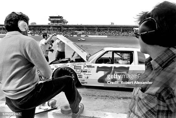 Driver Joe Millikan makes an unscheduled pit stop during the running of the 1981 Daytona 500 stock car race at Daytona International Speedway in...