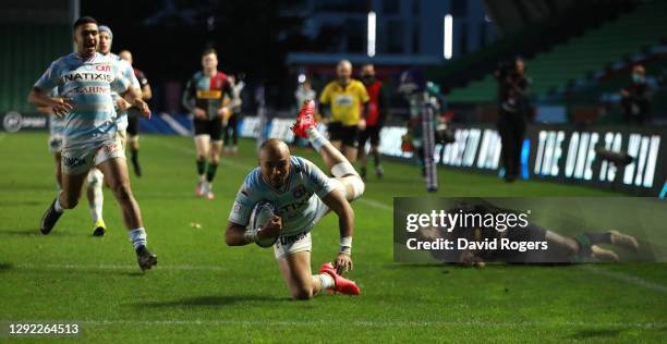 Simon Zebo of Racing 92 dives over for their third try during the Heineken Champions Cup Pool 2 match between Harlequins and Racing 92 at Twickenham...