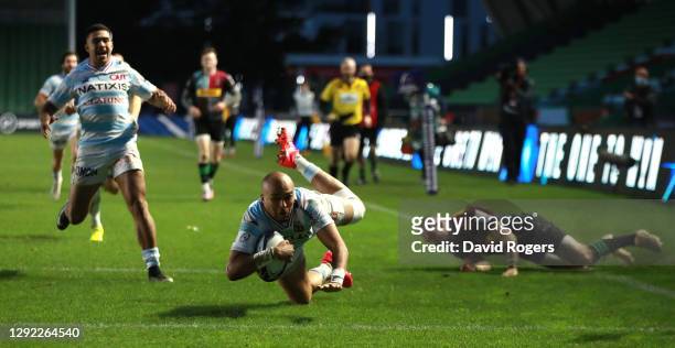 Simon Zebo of Racing 92 dives over for their third try during the Heineken Champions Cup Pool 2 match between Harlequins and Racing 92 at Twickenham...