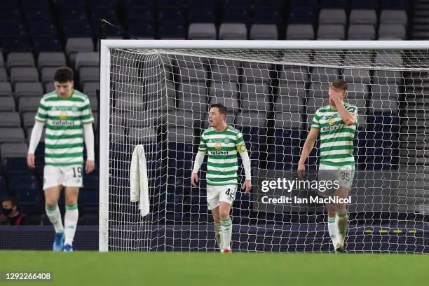 Callum McGregor and Kristoffer Ajer of Celtic look dejected after conceding their sides third goal in extra time during the William Hill Scottish Cup...