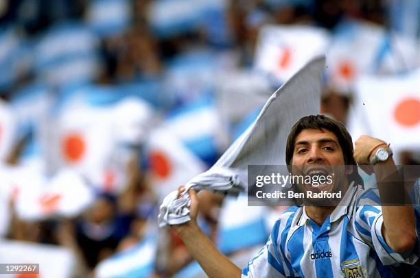 An Argentina fan shows his support during the World Cup group H game against Japan at the Stade Municipal in Toulouse, France. Argentina won 1-0. \...