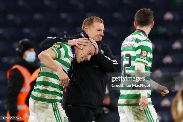 Neil Lennon, Manager of Celtic celebrates victory with Scott Brown of Celtic following a penalty shoot out in the William Hill Scottish Cup final...