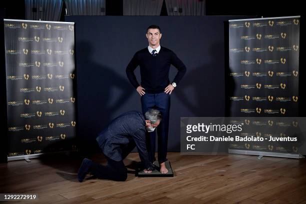 Juventus player Cristiano Ronaldo receives the Golden Foot Award on December 20, 2020 in Turin, Italy.