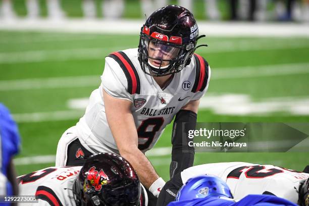 Drew Plitt of the Ball State Cardinals looks on against the Buffalo Bulls during the first half of the Rocket Mortgage MAC Football Championship at...