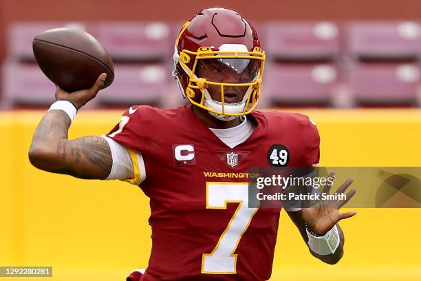 Quarterback Dwayne Haskins of the Washington Football Team looks to pass against the Seattle Seahawks in the first half at FedExField on December 20,...