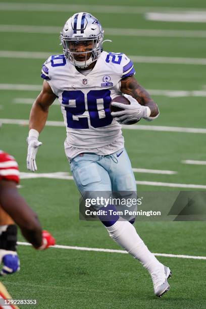 Running back Tony Pollard of the Dallas Cowboys runs against the San Francisco 49ers during the first quarter at AT&T Stadium on December 20, 2020 in...