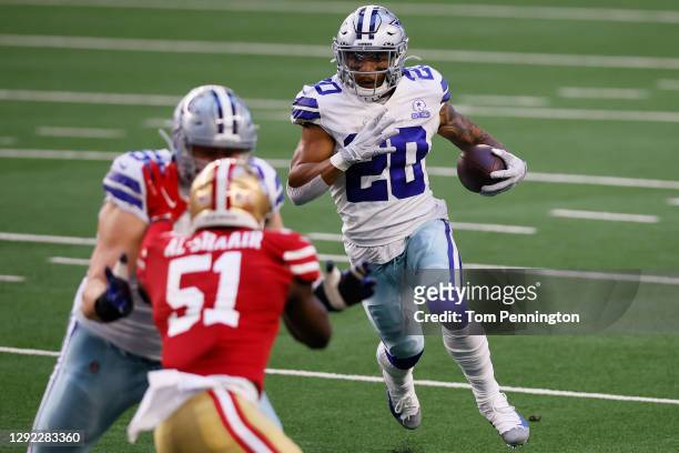 Running back Tony Pollard of the Dallas Cowboys runs against the San Francisco 49ers during the first quarter at AT&T Stadium on December 20, 2020 in...