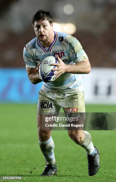 Henry Chavancy of Racing 92 runs with the ball during the Heineken Champions Cup Pool 2 match between Harlequins and Racing 92 at Twickenham Stoop on...