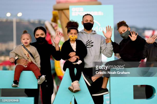 Canon W. Jack Curry, Ayesha Curry, Ryan Carson Curry, Stephen Curry, and Riley Elizabeth Curry attend Eat. Learn. Play., the 8th Annual Christmas...